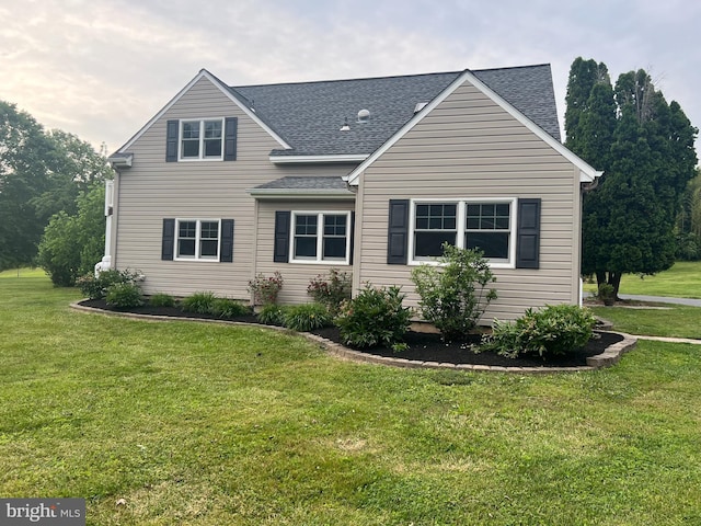 41 Elm Ln, Glenmoore, PA 19343 - view of front facade with a shingled roof and a front lawn