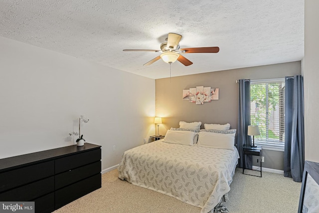 7810 Hanover Pkwy Unit 336, Greenbelt, MD 20770 - carpeted bedroom featuring baseboards, a textured ceiling, and a ceiling fan