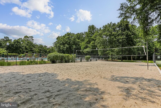 7810 Hanover Pkwy Unit 336, Greenbelt, MD 20770 - view of community featuring volleyball court and view of scattered trees