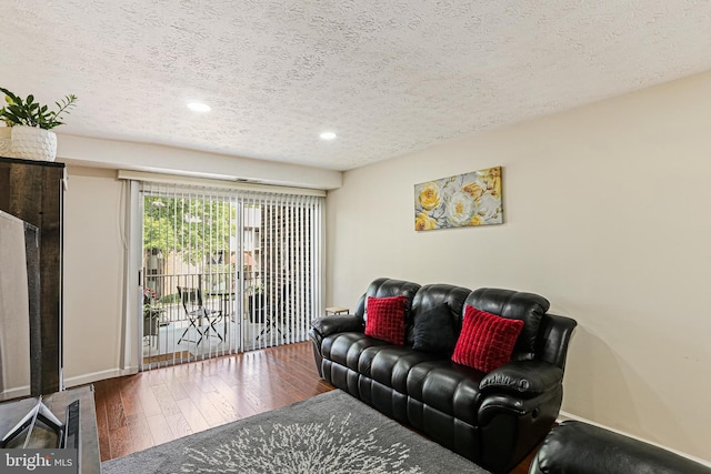 7810 Hanover Pkwy Unit 336, Greenbelt, MD 20770 - living area with a textured ceiling, hardwood / wood-style flooring, recessed lighting, and baseboards