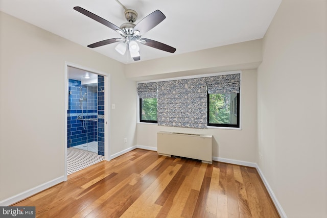 3701 Connecticut Ave NW Unit 312/326, Washington, DC 20008 - empty room with light wood finished floors, baseboards, and ceiling fan