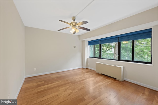 3701 Connecticut Ave NW Unit 312/326, Washington, DC 20008 - spare room with radiator, light wood finished floors, baseboards, and a ceiling fan
