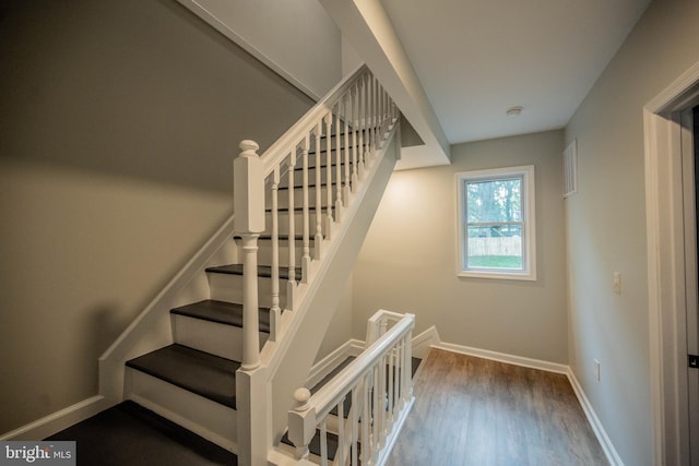 511 S Kent St, Winchester, VA 22601 - staircase with wood finished floors and baseboards