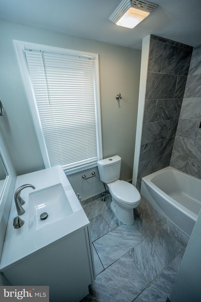 511 S Kent St, Winchester, VA 22601 - full bath with toilet, vanity, and marble look tile flooring