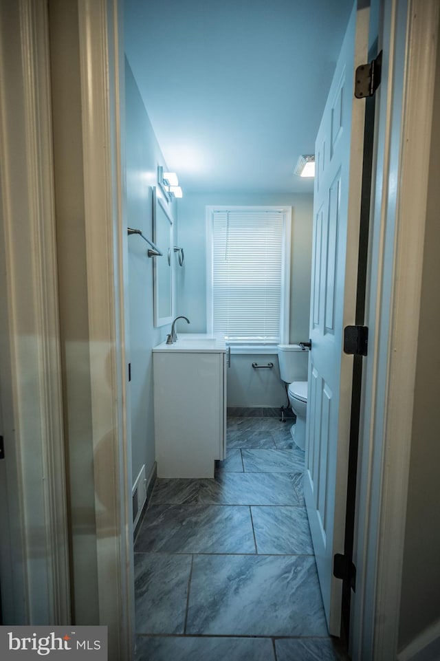 511 S Kent St, Winchester, VA 22601 - bathroom with toilet and vanity