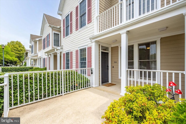 214 October Glory Ave Unit 214G, Ocean View, DE 19970 - property entrance featuring covered porch and a balcony