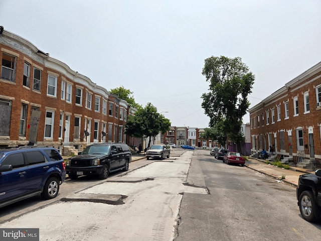 20 N Bentalou St, Baltimore, MD 21223 - view of asphalt street with sidewalks, curbs, and a residential view
