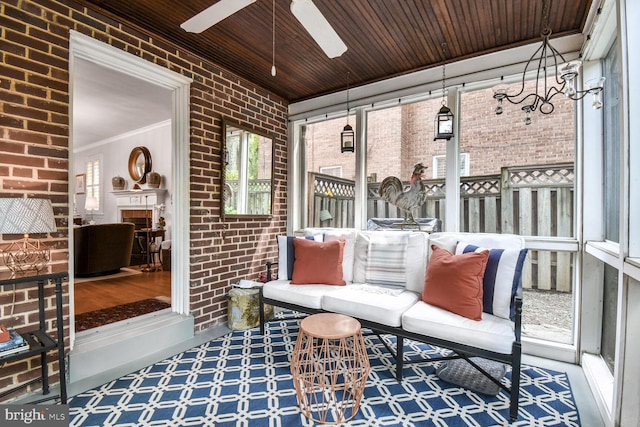 4212 Ingomar St NW, Washington, DC 20015 - sunroom featuring brick wall, ceiling fan, tile patterned floors, wood ceiling, and a fireplace