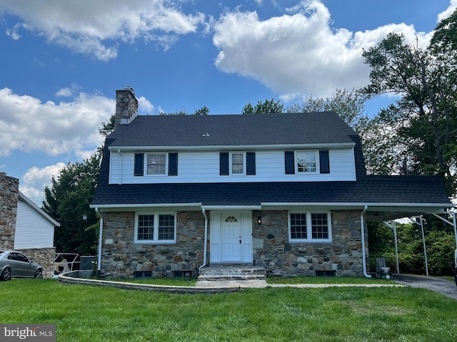 8818 Greens Ln, Randallstown, MD 21133 - view of front of property featuring stone siding, a chimney, a shingled roof, and a front yard