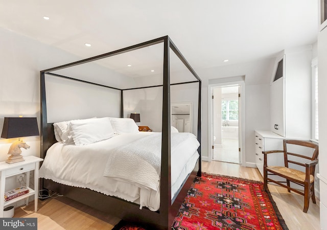 7006 Meadow Ln, Chevy Chase, MD 20815 - bedroom featuring light wood-style floors, recessed lighting, and connected bathroom