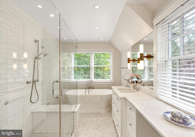 7006 Meadow Ln, Chevy Chase, MD 20815 - full bath featuring plenty of natural light, a shower stall, vanity, a soaking tub, and recessed lighting