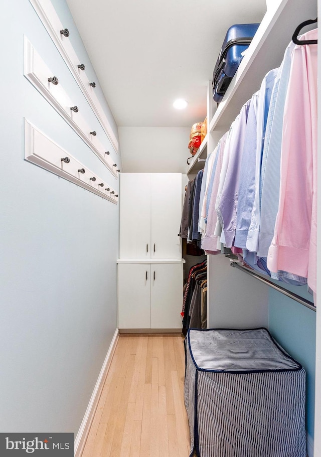 7006 Meadow Ln, Chevy Chase, MD 20815 - walk in closet featuring light wood-style flooring