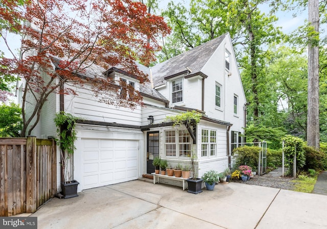 7006 Meadow Ln, Chevy Chase, MD 20815 - view of front of house with an attached garage and concrete driveway
