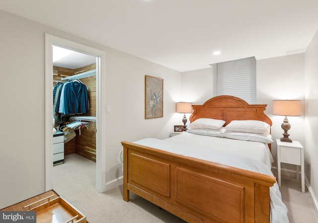 7006 Meadow Ln, Chevy Chase, MD 20815 - bedroom with a walk in closet, light carpet, a closet, baseboards, and recessed lighting