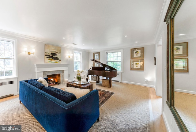 7006 Meadow Ln, Chevy Chase, MD 20815 - living area featuring radiator, a premium fireplace, ornamental molding, recessed lighting, and baseboards