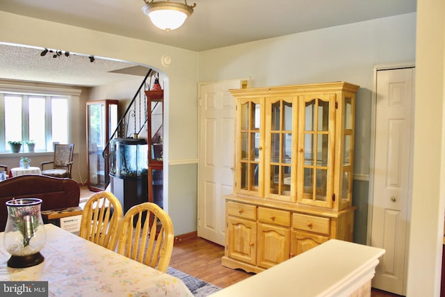 4520 Strahle St, Philadelphia, PA 19136 - dining space with arched walkways and light wood finished floors