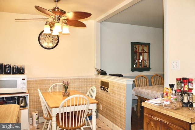 4520 Strahle St, Philadelphia, PA 19136 - dining space with ceiling fan and wainscoting