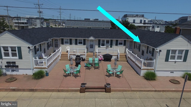 5515 Long Bch Unit 5, Beach Haven, NJ 08008 - rear view of property with outdoor dining space, a patio area, and a residential view