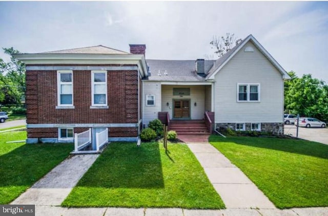 6136 Magnolia Ave, Pennsauken, NJ 08109 - view of front facade with a front yard and brick siding
