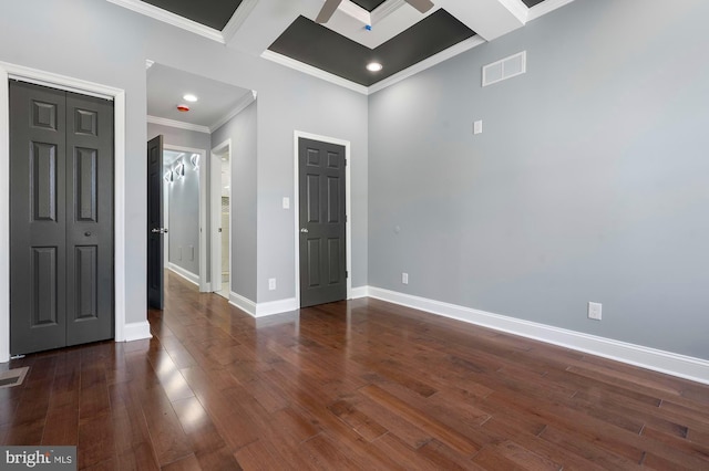 1513 N Wolfe St, Baltimore, MD 21213 - empty room with ornamental molding, coffered ceiling, baseboards, wood finished floors, and beamed ceiling