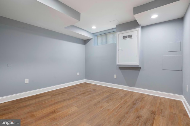 1513 N Wolfe St, Baltimore, MD 21213 - finished basement featuring baseboards, light wood finished floors, and recessed lighting