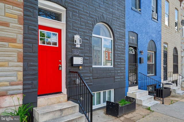 1513 N Wolfe St, Baltimore, MD 21213 - doorway to property featuring stone siding