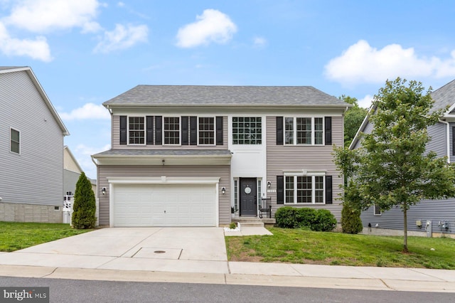 1408 Canopy Ln, Odenton, MD 21113 - view of front of property with concrete driveway, a garage, and a front lawn