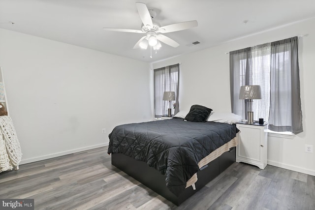 1408 Canopy Ln, Odenton, MD 21113 - bedroom with wood finished floors and a ceiling fan