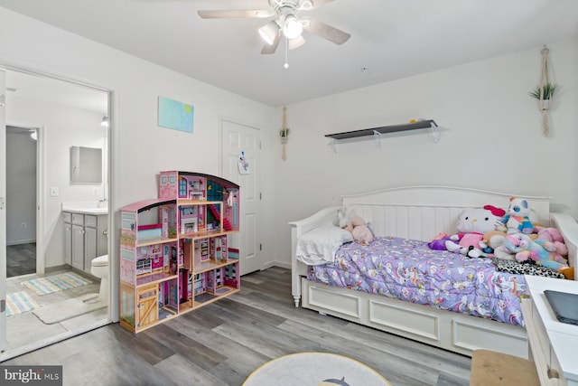 1408 Canopy Ln, Odenton, MD 21113 - bedroom with wood finished floors, ensuite bath, and a ceiling fan