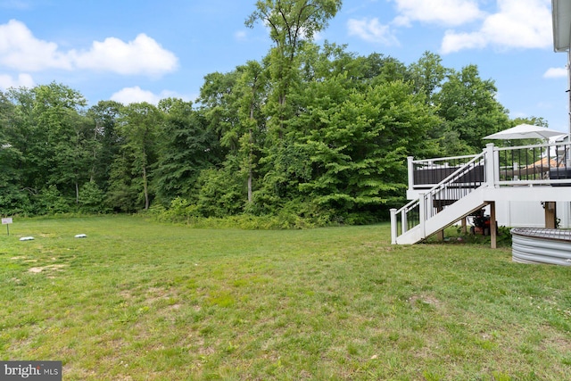 1408 Canopy Ln, Odenton, MD 21113 - view of green lawn featuring stairway and a wooden deck