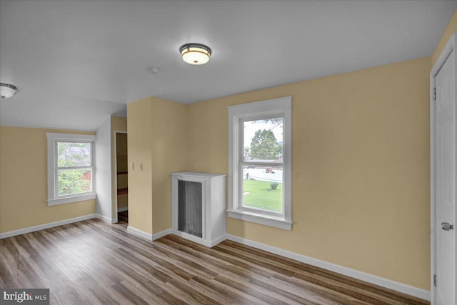 937 Fern Ave, Reading, PA 19607 - unfurnished living room with wood finished floors and baseboards