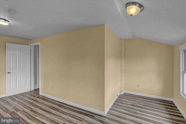 937 Fern Ave, Reading, PA 19607 - empty room with baseboards, wood finished floors, lofted ceiling, and a smoke detector