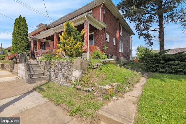 937 Fern Ave, Reading, PA 19607 - view of front of property featuring a porch and brick siding