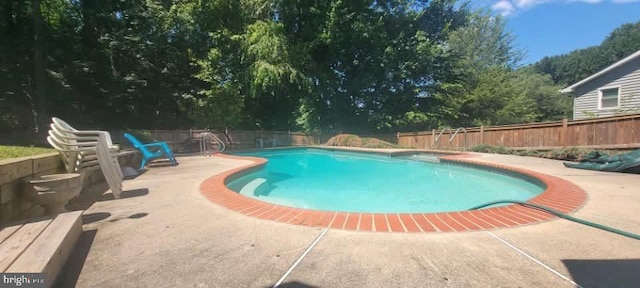 18924 Tributary Ln, Gaithersburg, MD 20879 - view of swimming pool featuring a patio and a fenced backyard