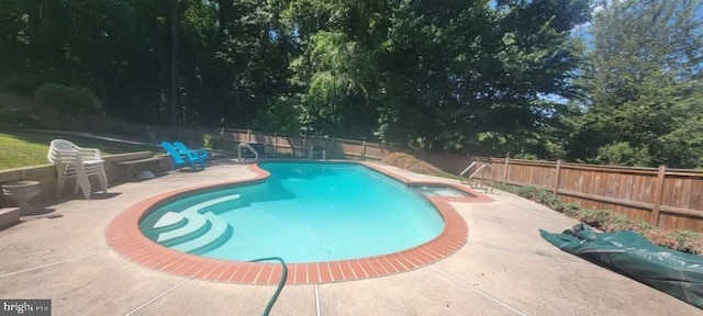 18924 Tributary Ln, Gaithersburg, MD 20879 - view of swimming pool featuring a patio area, a fenced backyard, and view of scattered trees