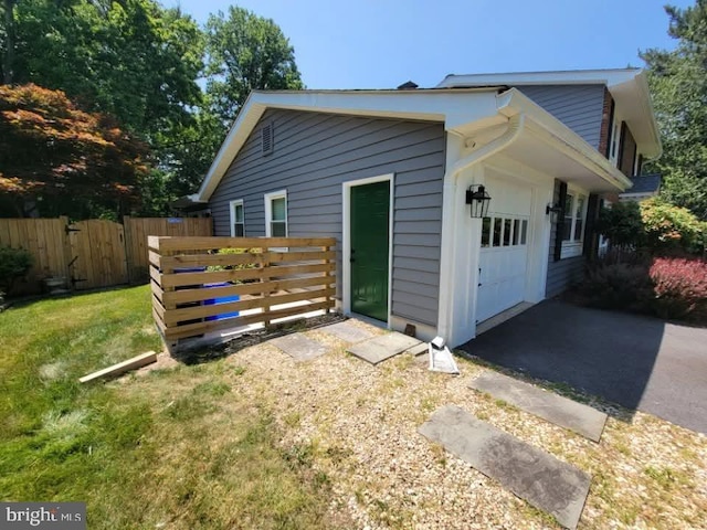 18924 Tributary Ln, Gaithersburg, MD 20879 - back of house with a garage and driveway