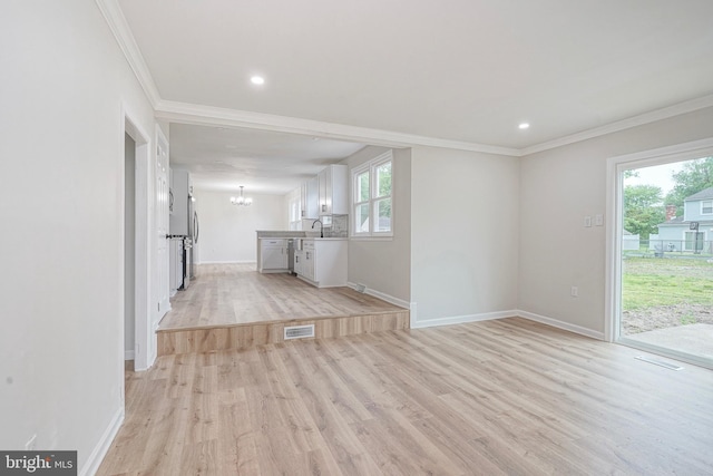 26 Jefferson Dr, Clementon, NJ 08021 - unfurnished living room with a chandelier, light wood-type flooring, baseboards, crown molding, and recessed lighting