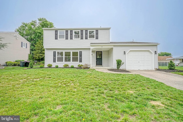 26 Jefferson Dr, Clementon, NJ 08021 - colonial house with a garage, concrete driveway, and a front yard