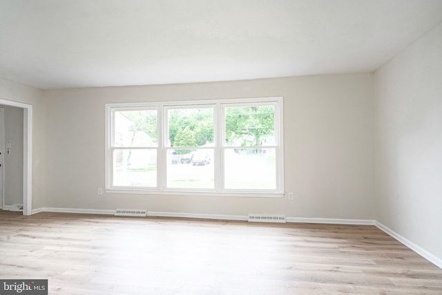 26 Jefferson Dr, Clementon, NJ 08021 - spare room with plenty of natural light, light wood-style flooring, and baseboards