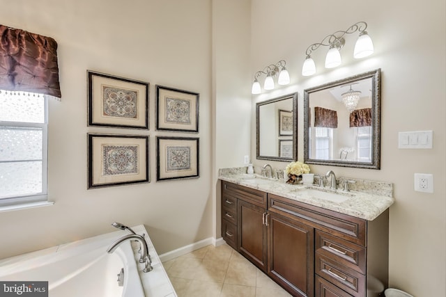 11211 Little Fox Ln, Germantown, MD 20876 - bathroom featuring double vanity, a bath, tile patterned floors, and baseboards