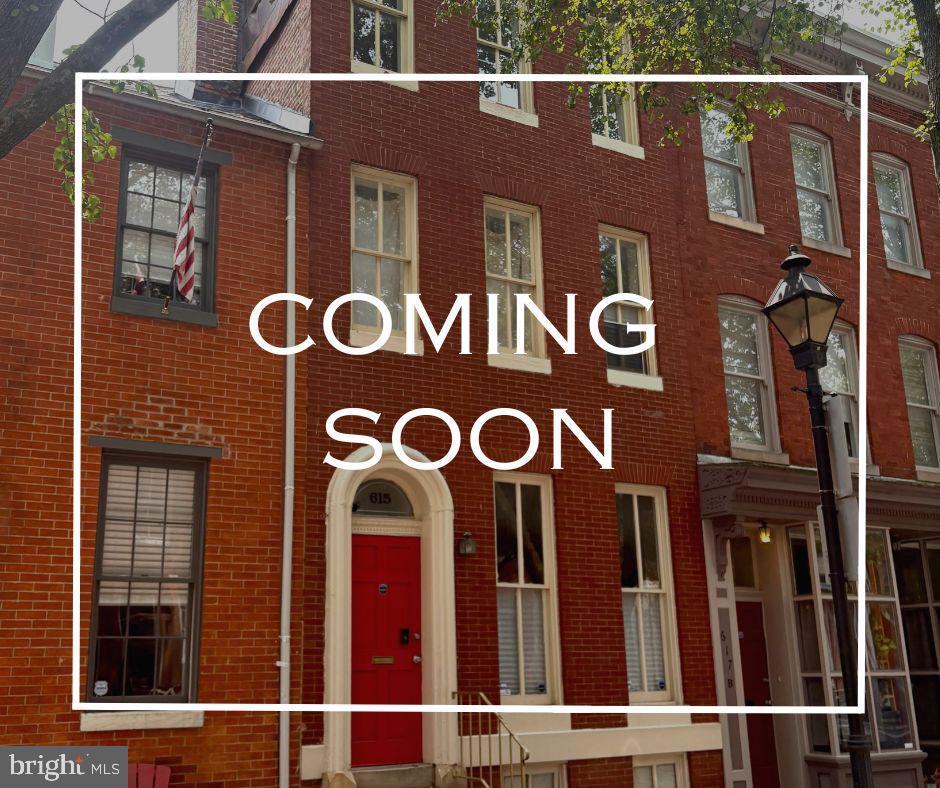 615 S Paca St, Baltimore, MD 21230 - view of front of home with brick siding
