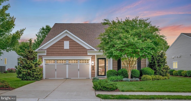 43 Battery Point Dr, Fredericksburg, VA 22406 - view of front of property with concrete driveway, a front yard, roof with shingles, and a garage