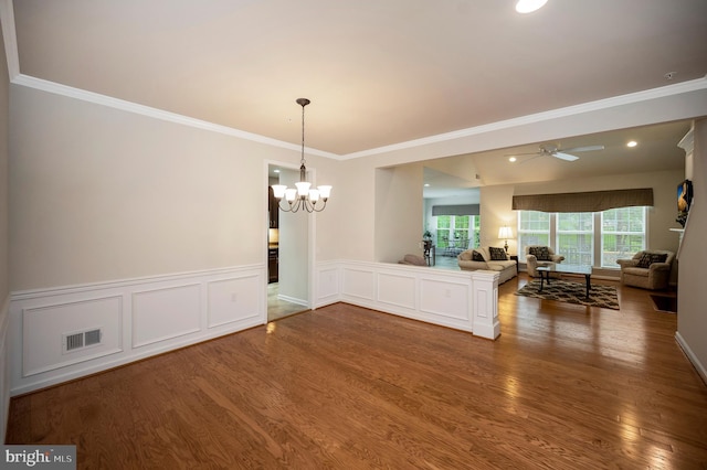 43 Battery Point Dr, Fredericksburg, VA 22406 - empty room featuring wood finished floors, a chandelier, a ceiling fan, crown molding, and recessed lighting