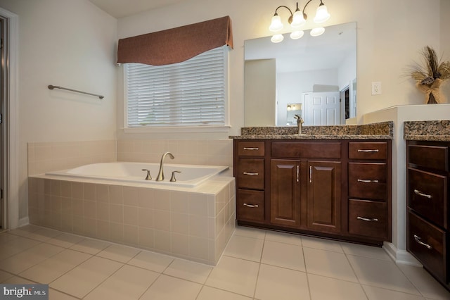 43 Battery Point Dr, Fredericksburg, VA 22406 - bathroom with vanity, tile patterned floors, and a garden tub