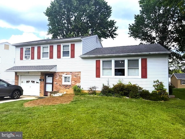 122 S Dillwyn Rd, Newark, DE 19711 - view of front facade featuring an attached garage, brick siding, a front yard, and driveway