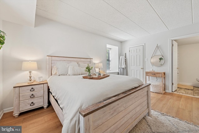 711 Washington Pl Unit 11, Chesterbrook, PA 19087 - bedroom with light wood finished floors and baseboards