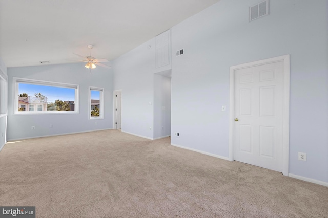 1131 Long Beach Blvd, Long Beach Township, NJ 08008 - empty room with light colored carpet, ceiling fan, baseboards, and high vaulted ceiling