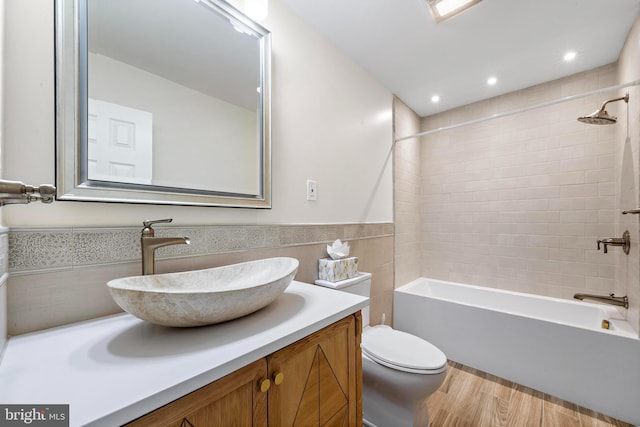 1131 Long Beach Blvd, Long Beach Township, NJ 08008 - bathroom with vanity, toilet, shower / tub combination, wood finished floors, and tile walls