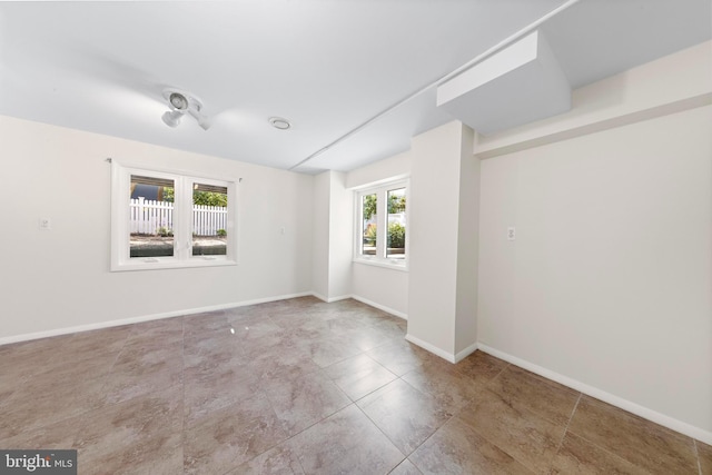 1131 Long Beach Blvd, Long Beach Township, NJ 08008 - tiled spare room featuring baseboards