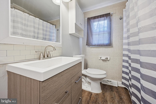 1013 S Scott Ave, Lindenwold, NJ 08021 - full bath featuring wood finished floors, vanity, toilet, tile walls, and a shower with shower curtain